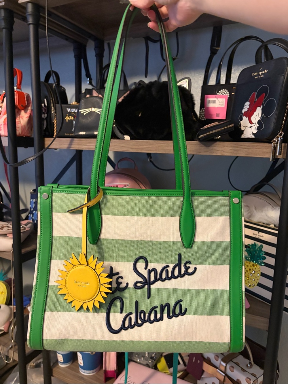 kate spade green and white striped tote with yellow sun charm